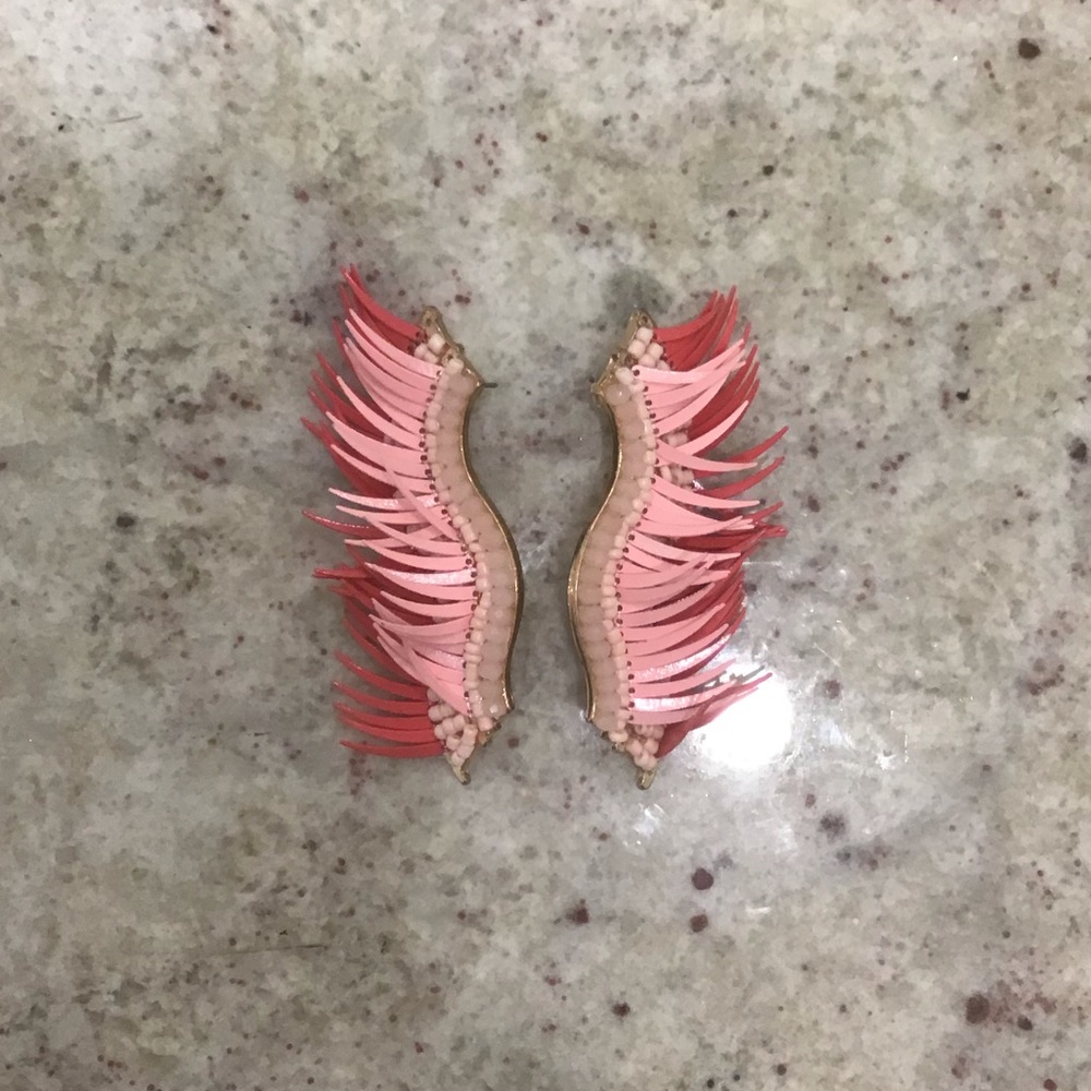 Pink wing statement earrings